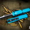 Microtech Ultratech Turquoise Hellhound OTF Automatic Knife 3.4" Black 119-1TQS 1 Microtech Ultratech Turquoise Hellhound OTF Automatic Knife 3.4" Black 119-1TQS -Best Knifes Shop 119 1 TQS 2 78254.1688657031