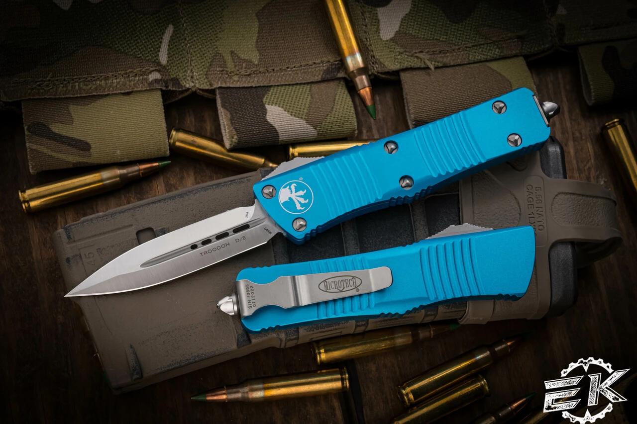 Microtech Troodon OTF Automatic Knife Turquoise 3" Dagger Satin 138-4TQ 3 Microtech Troodon OTF Automatic Knife Turquoise 3" Dagger Satin 138-4TQ