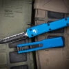 Microtech UTX-70 OTF Automatic Knife Blue 2.4" Dagger Black Serrated 147-3BL 1 Microtech UTX-70 OTF Automatic Knife Blue 2.4" Dagger Black Serrated 147-3BL -Best Knifes Shop 147 3 BL 2 96116.1678167461