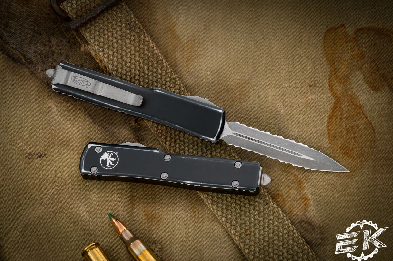 Microtech UTX-70 OTF Automatic Knife Distressed Black 2.4" Dagger Double Full Serrated Stonewash 147-D12DBK 4 Microtech UTX-70 OTF Automatic Knife Distressed Black 2.4" Dagger Double Full Serrated Stonewash 147-D12DBK - Image 2