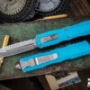 Microtech Dirac OTF Automatic Knife Turquoise 3" Dagger Stonewash Serrated 225-12TQ 2 Microtech Dirac OTF Automatic Knife Turquoise 3" Dagger Stonewash Serrated 225-12TQ -Best Knifes Shop 225 12 TQ 2 17239.1691445775