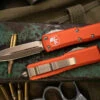 Microtech UTX-85 OTF Automatic Knife Orange 3.1" Dagger Bronze 232-13OR 2 Microtech UTX-85 OTF Automatic Knife Orange 3.1" Dagger Bronze 232-13OR -Best Knifes Shop 232 13 OR 47193.1684274623