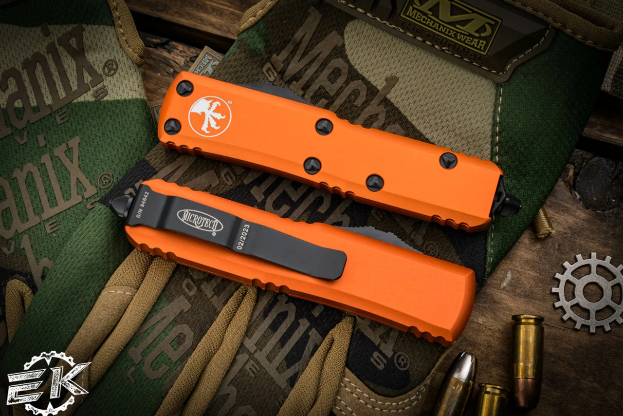 Microtech UTX-85 OTF Automatic Knife Orange 3" Dagger Serrated Black 232-2OR 4 Microtech UTX-85 OTF Automatic Knife Orange 3" Dagger Serrated Black 232-2OR - Image 2